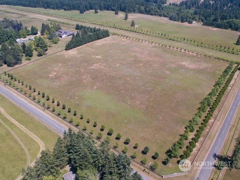 22710 Wax Orchard Road Southwest Vashon, WA 98070 - Photo 5 of 21 a view of a yard with an ocean