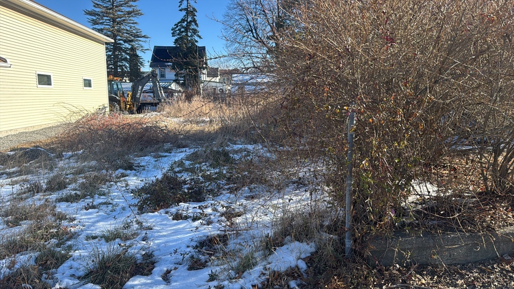 861 Main Street Clinton, MA 01510 - Photo 3 of 3 a view of a backyard of the house