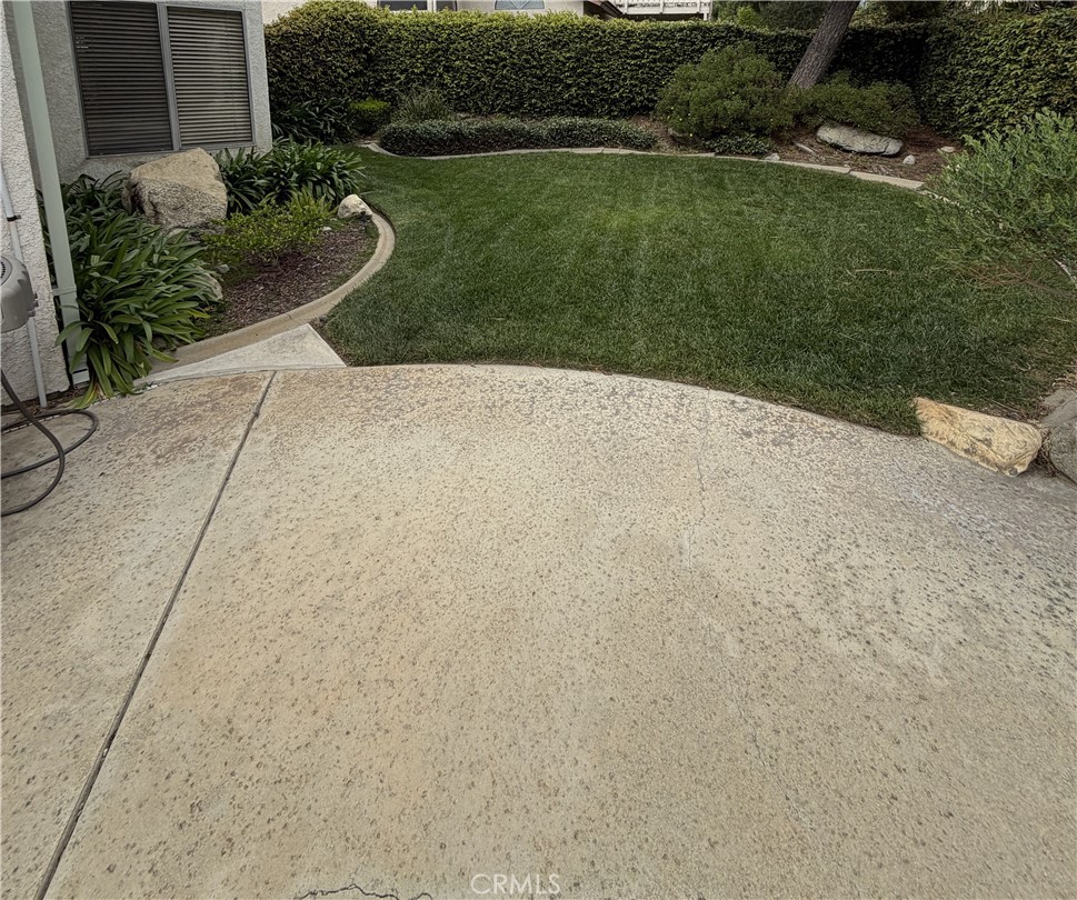 6369 Chandon Place Rancho Cucamonga, CA 91737 - Photo 4 of 4 Lawn and patio adjacent to the pool and spa.