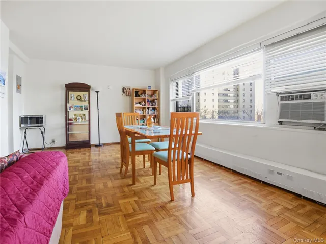 a view of a livingroom with furniture and window