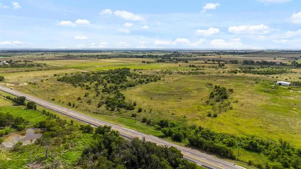 a view of a lake from a yard