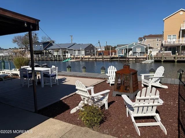 a view of a patio with couches table and chairs