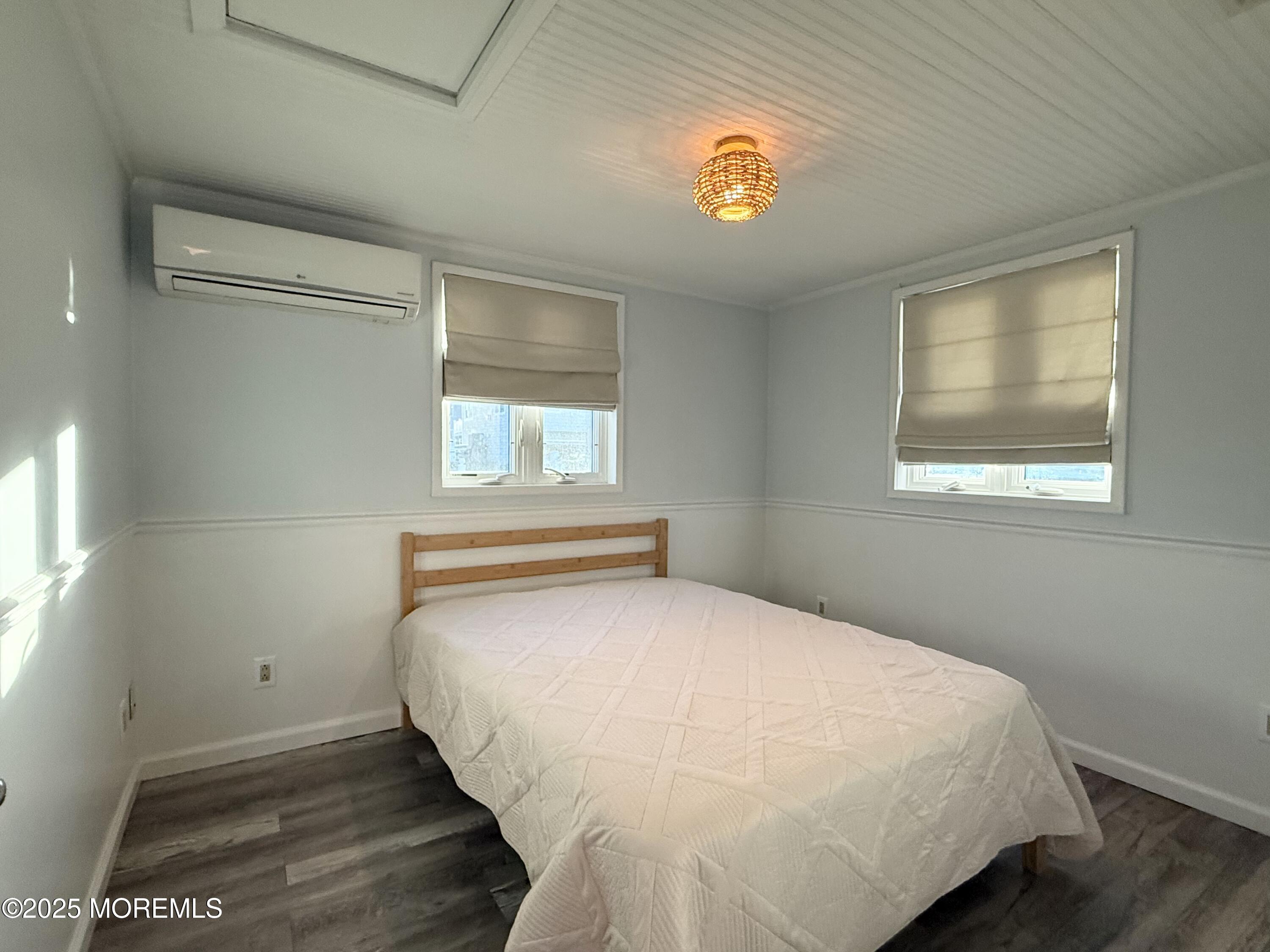 237 Butler Boulevard Bayville, NJ 08721 - Photo 11 of 25 a bedroom with a bed and a window