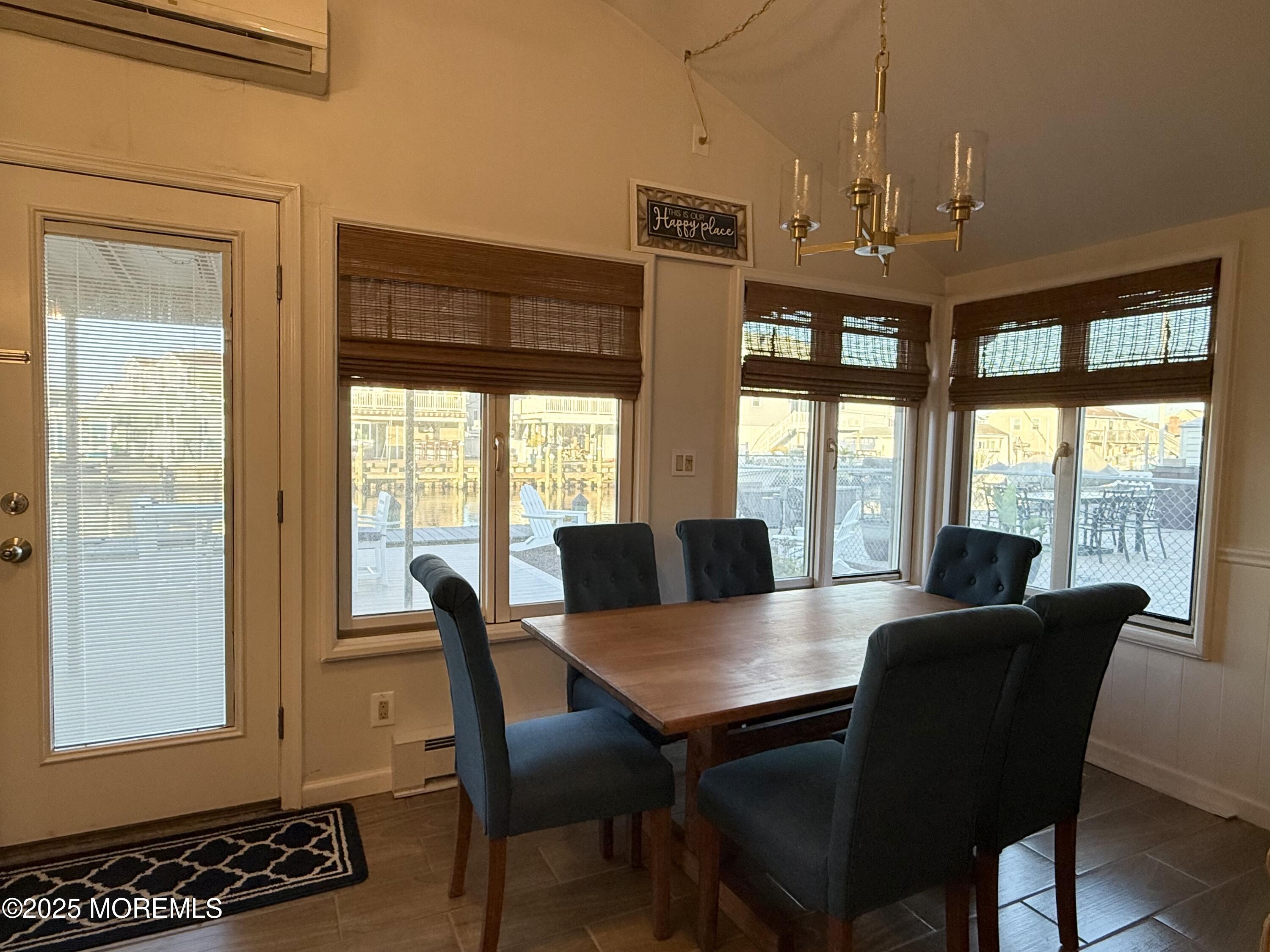 237 Butler Boulevard Bayville, NJ 08721 - Photo 6 of 25 a view of a dining room with furniture window and outside view