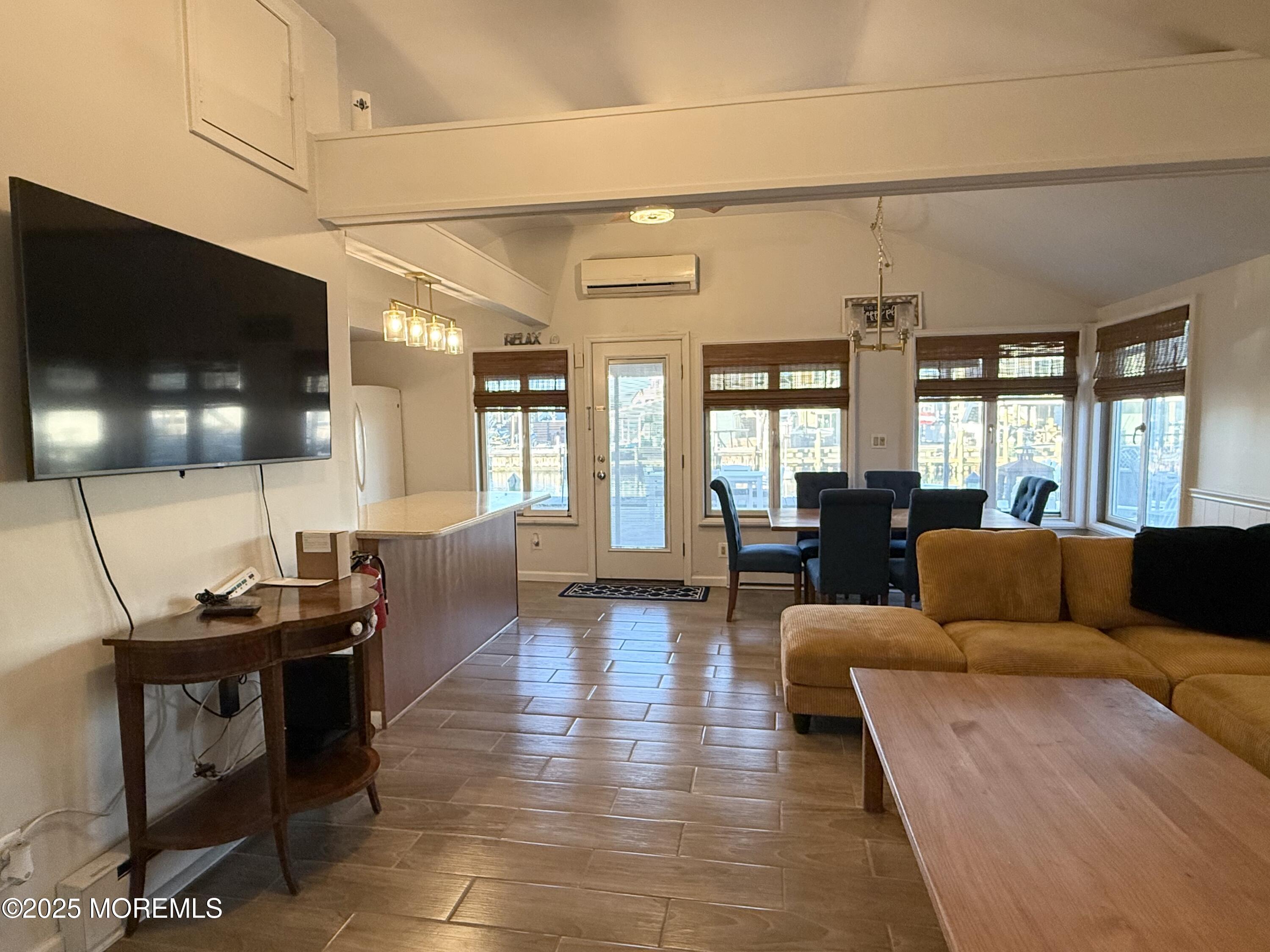 237 Butler Boulevard Bayville, NJ 08721 - Photo 7 of 25 a living room with furniture and a flat screen tv
