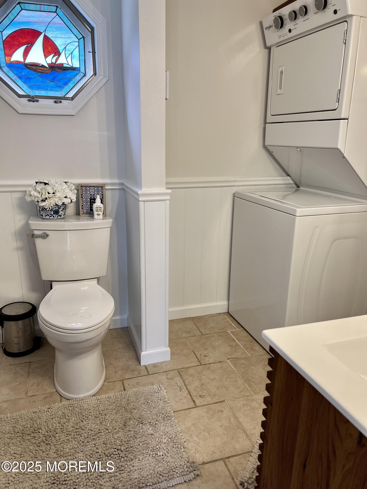 237 Butler Boulevard Bayville, NJ 08721 - Photo 9 of 25 a bathroom with a toilet and a sink