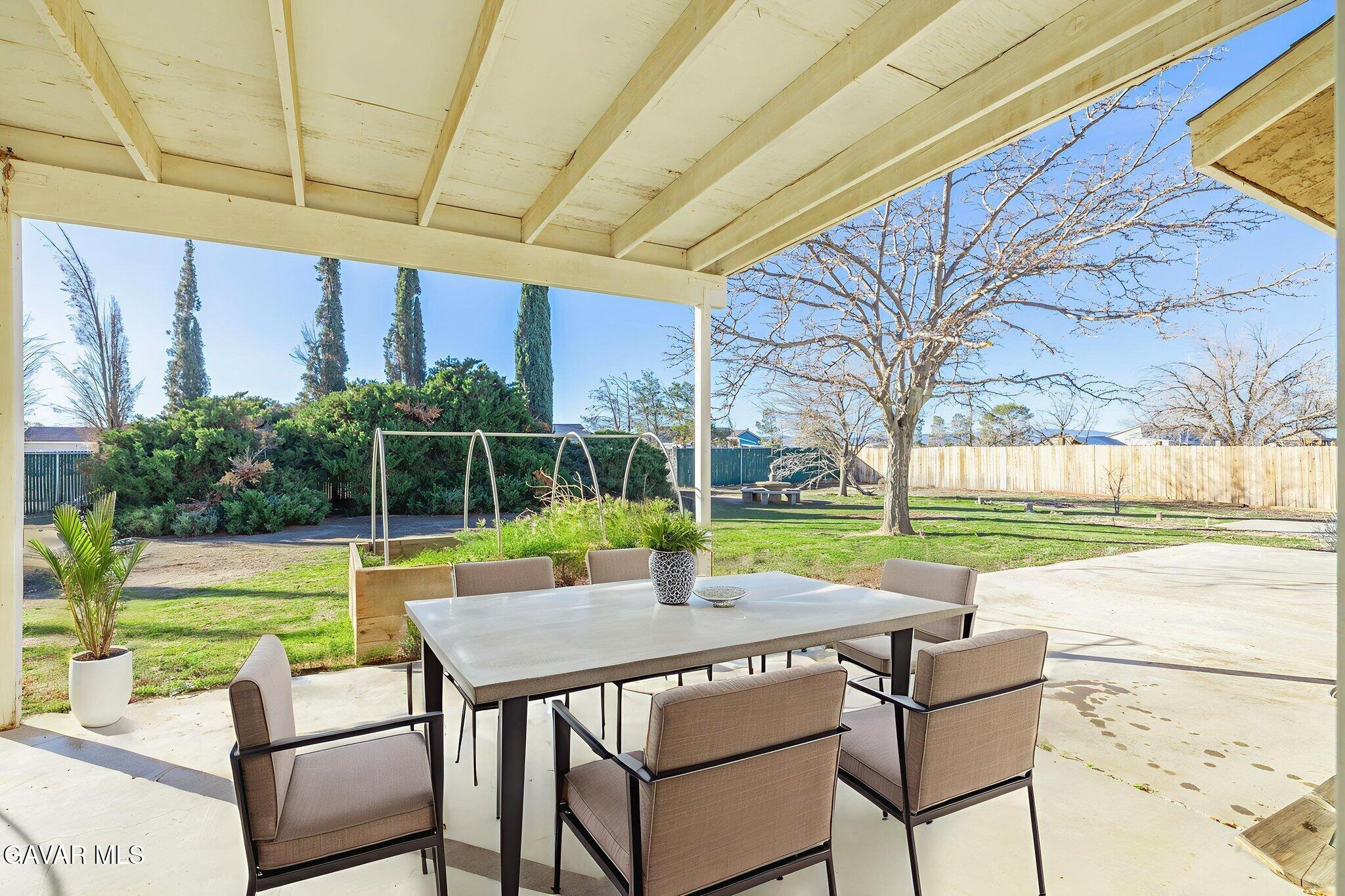 7930 Elder Avenue Rosamond, CA 93560 - Photo 27 of 35 a view of a swimming pool with a patio