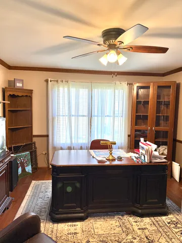 a room with furniture and window