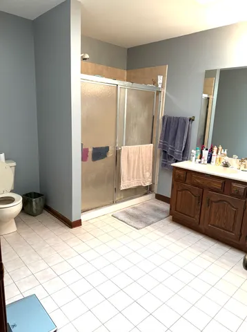 a bathroom with a bathtub sink and toilet
