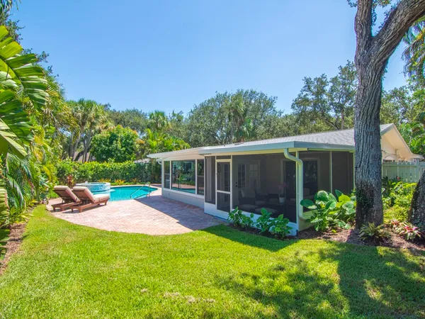 a view of a backyard with a patio