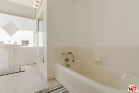 a bathroom with bathtub