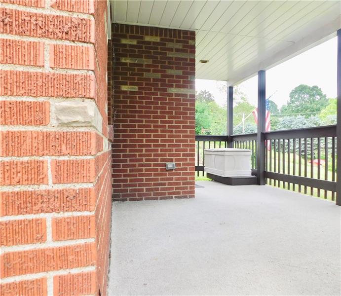 2285 Monroeville Road Monroeville, PA 15146 - Photo 23 of 24 ROOMY FRONT PORCH TO SIT ON AND READ A BOOK.