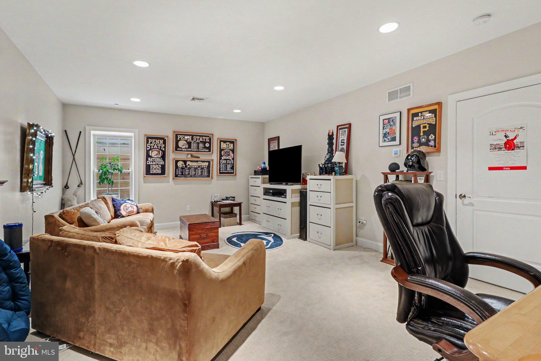 1080 Swatara Road Hershey, PA 17033 - Photo 43 of 59 a living room with furniture and a flat screen tv