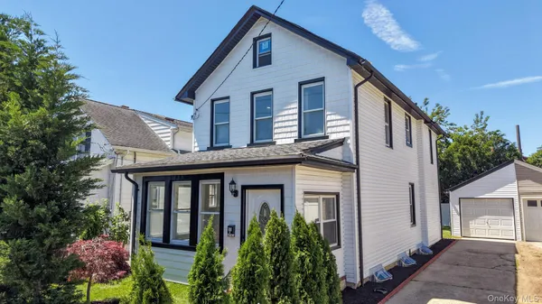 $975,000 | 55 Hartwell Place, Woodmere, NY 11598