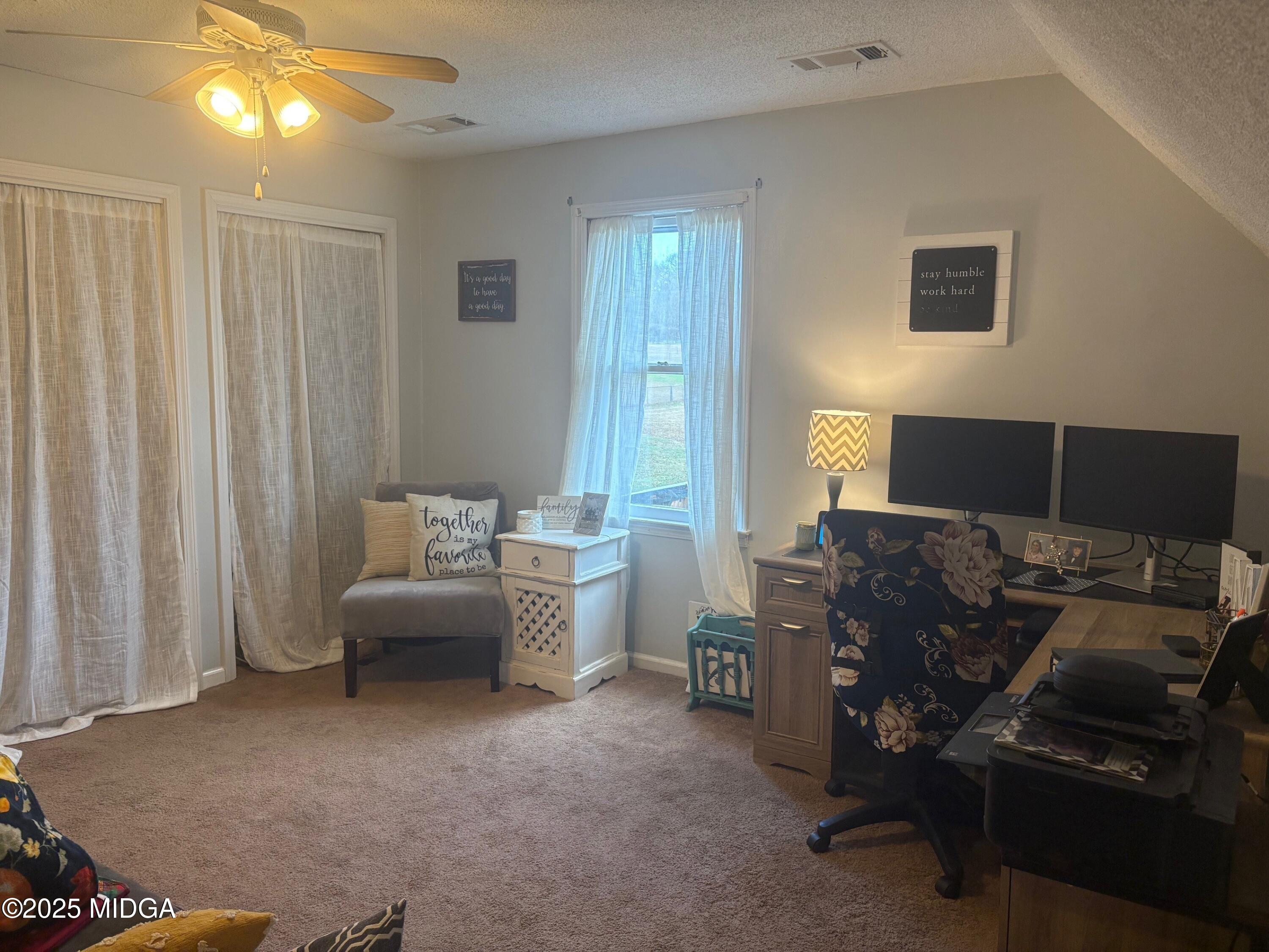 132 Old Hickory Road Byron, GA 31008 - Photo 15 of 35 a living room with furniture and a window