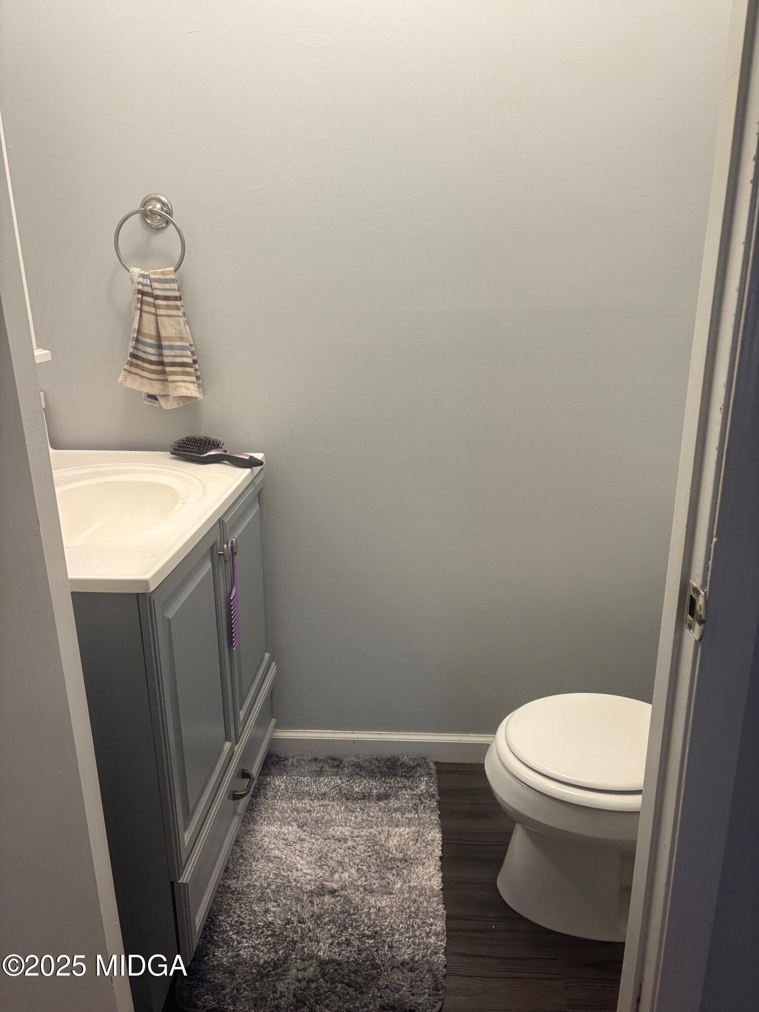 132 Old Hickory Road Byron, GA 31008 - Photo 19 of 35 a bathroom with a sink and a toilet