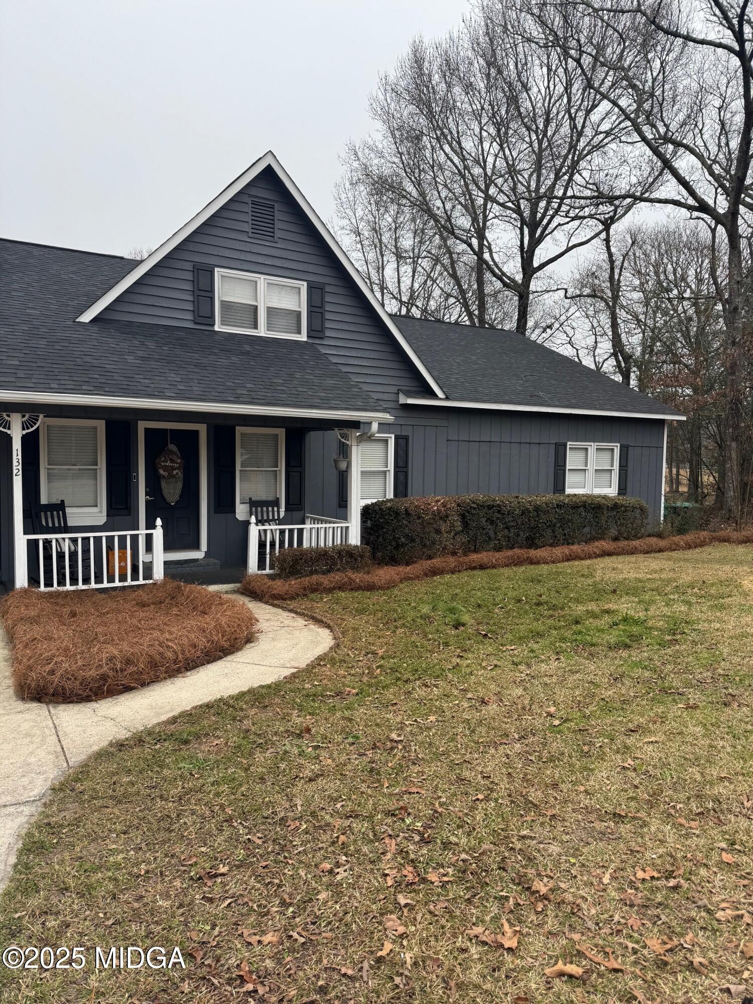 132 Old Hickory Road Byron, GA 31008 - Photo 2 of 35 a front view of a house with garden