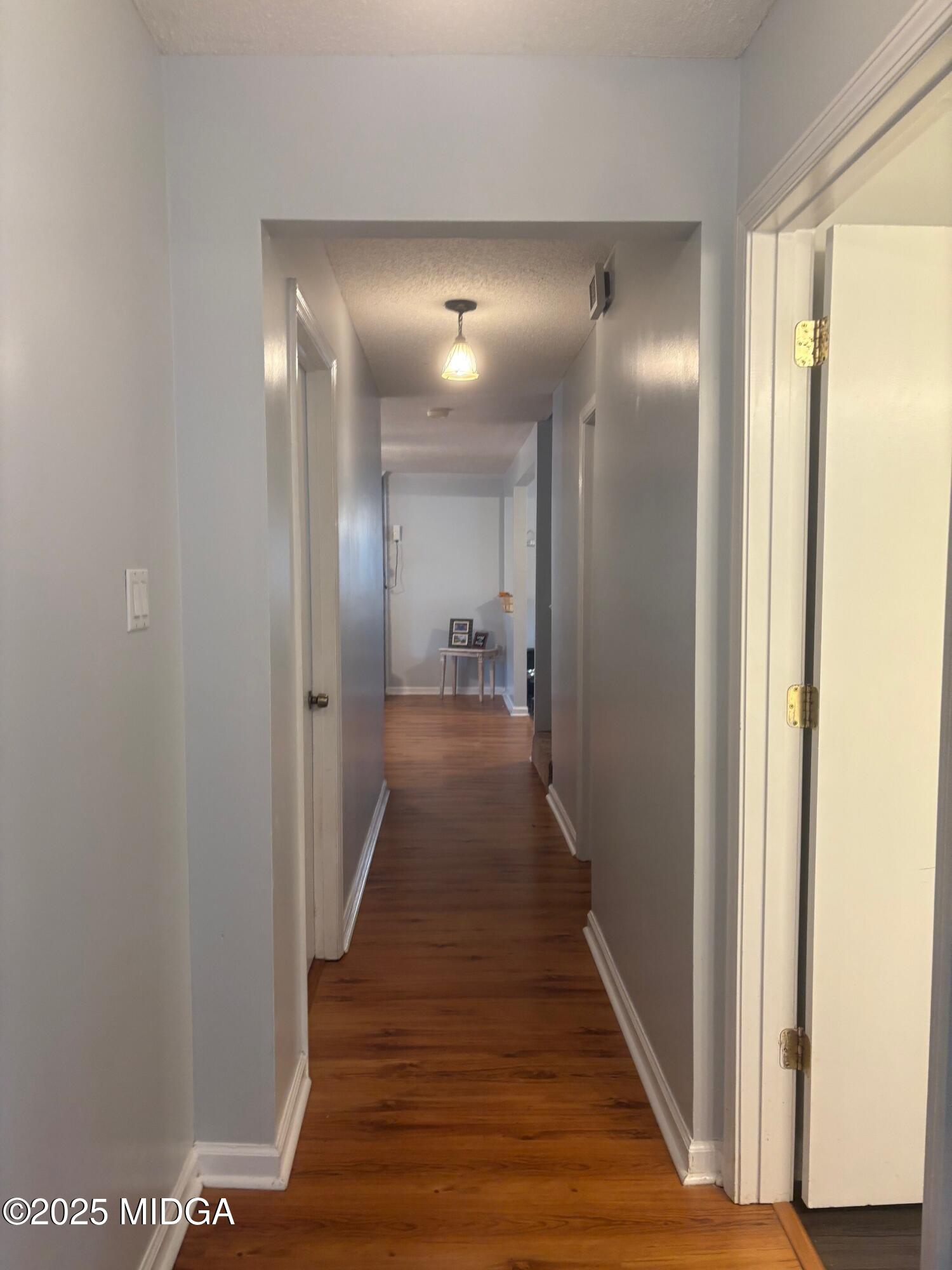 132 Old Hickory Road Byron, GA 31008 - Photo 21 of 35 a view of hallway with wooden floor