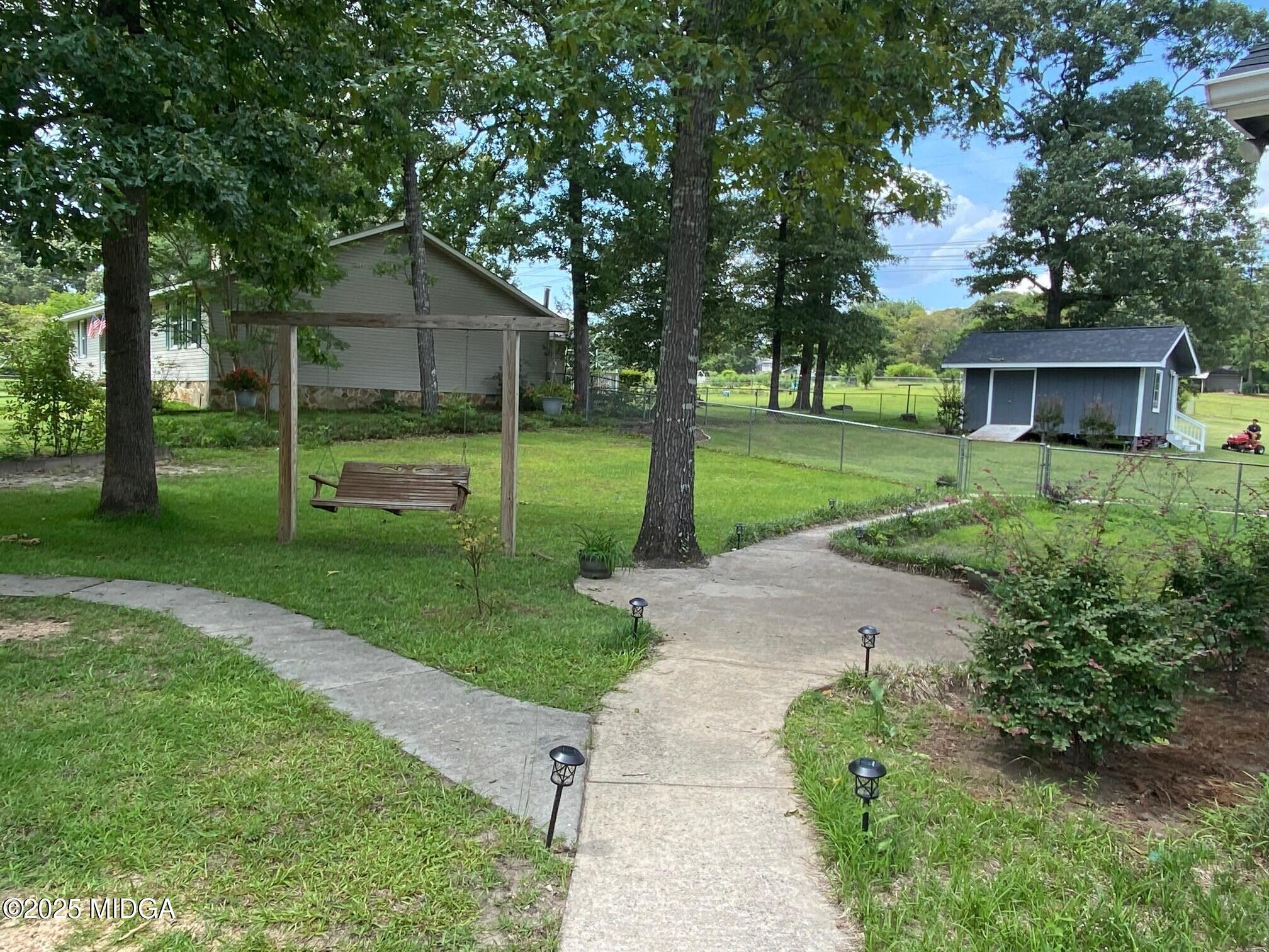 132 Old Hickory Road Byron, GA 31008 - Photo 23 of 35 a house view with a garden space