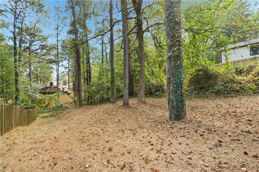 2139 Trailwood Road Decatur, GA 30032 - Photo 20 of 21 a backyard of a house with lots of green space