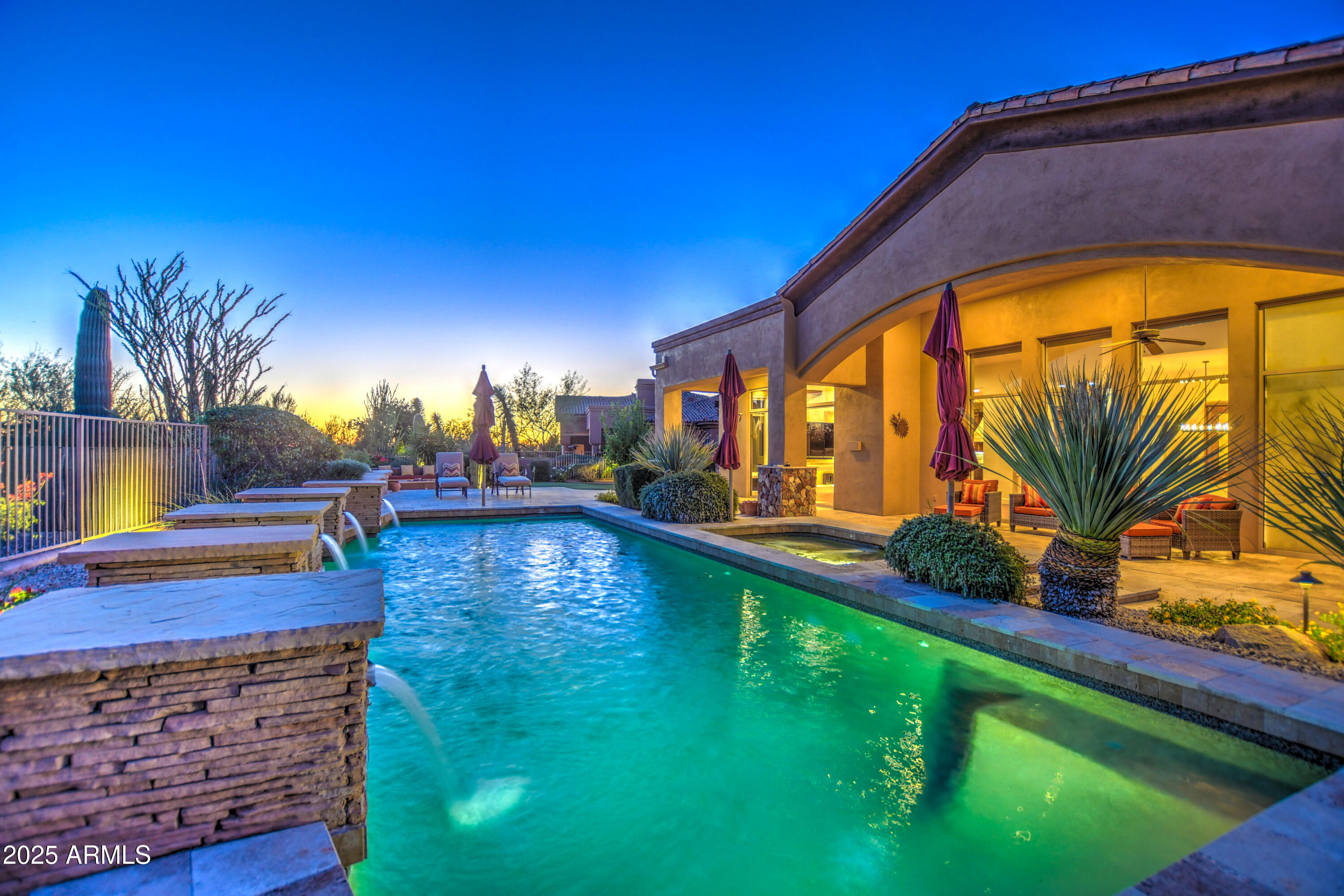 9671 East Monument Drive Scottsdale, AZ 85262 - Photo 109 of 124 a view of swimming pool with a garden and seating area