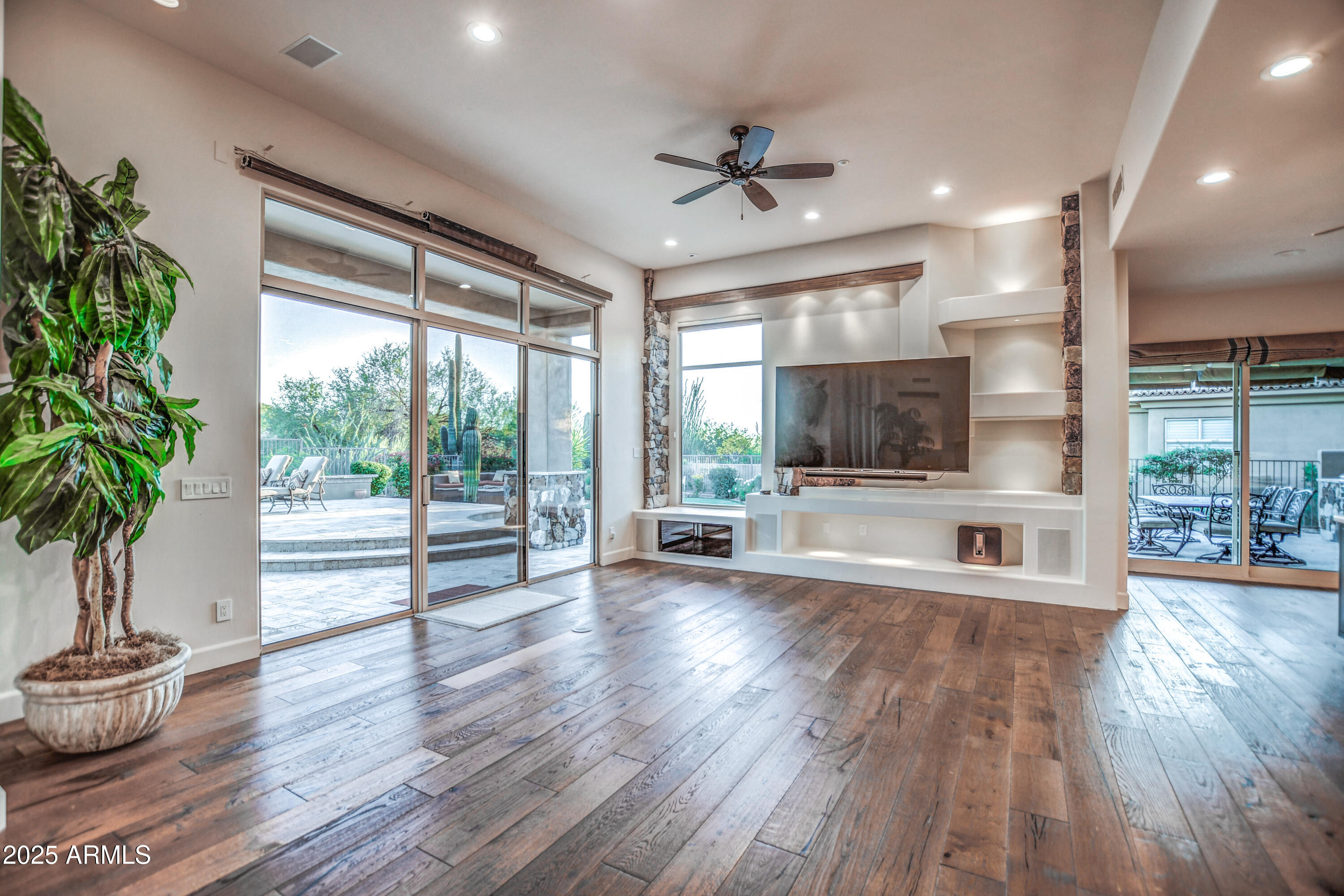 9671 East Monument Drive Scottsdale, AZ 85262 - Photo 18 of 124 a living room with furniture and a large window