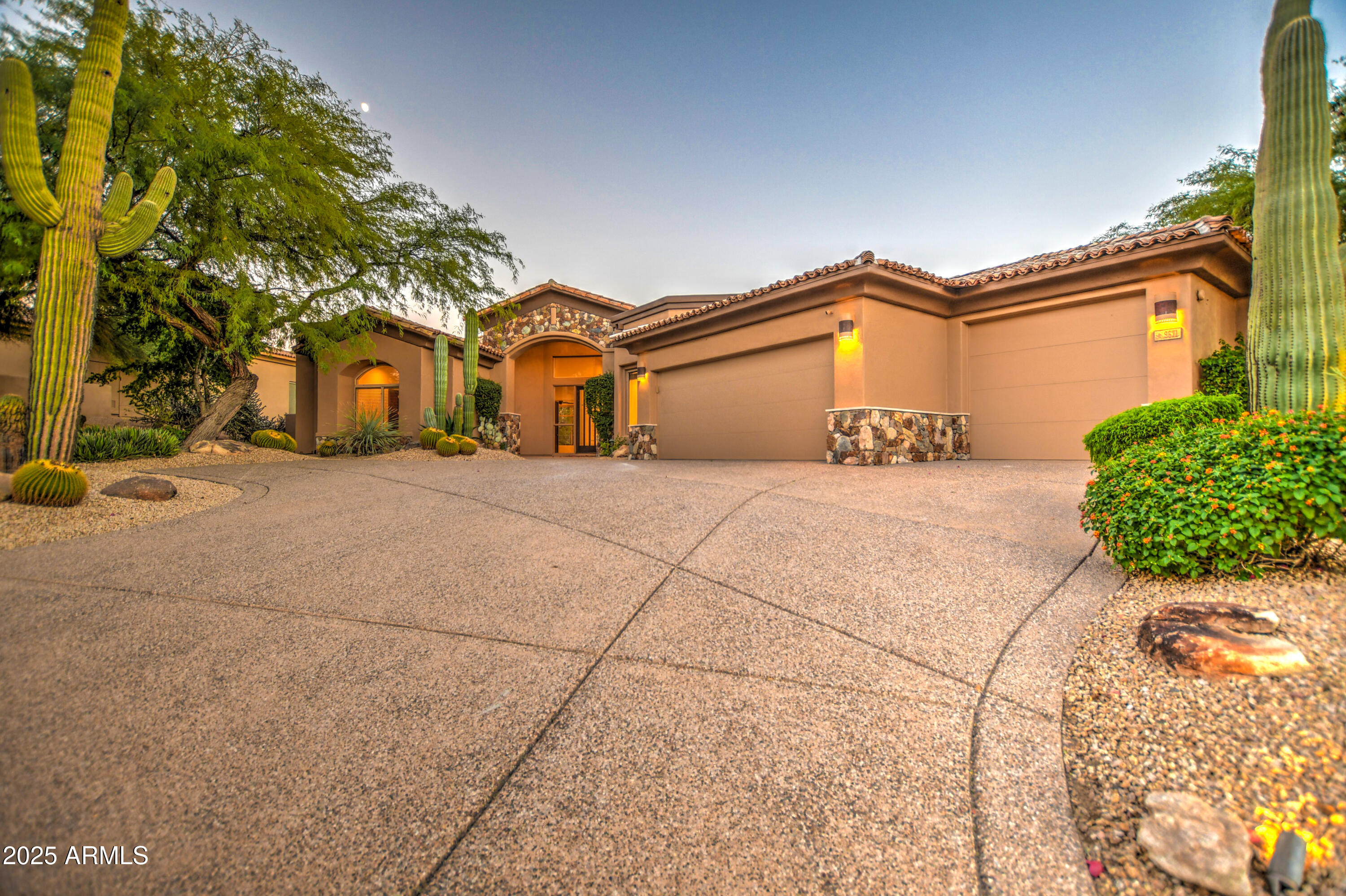 9671 East Monument Drive Scottsdale, AZ 85262 - Photo 73 of 124 a view of a house with a yard and potted plants