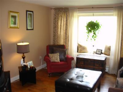 525 Governor Prence Road Eastham, MA 02642 - Photo 3 of 8 a living room with furniture and a potted plant
