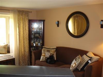 525 Governor Prence Road Eastham, MA 02642 - Photo 4 of 8 a view of a livingroom with furniture and windows