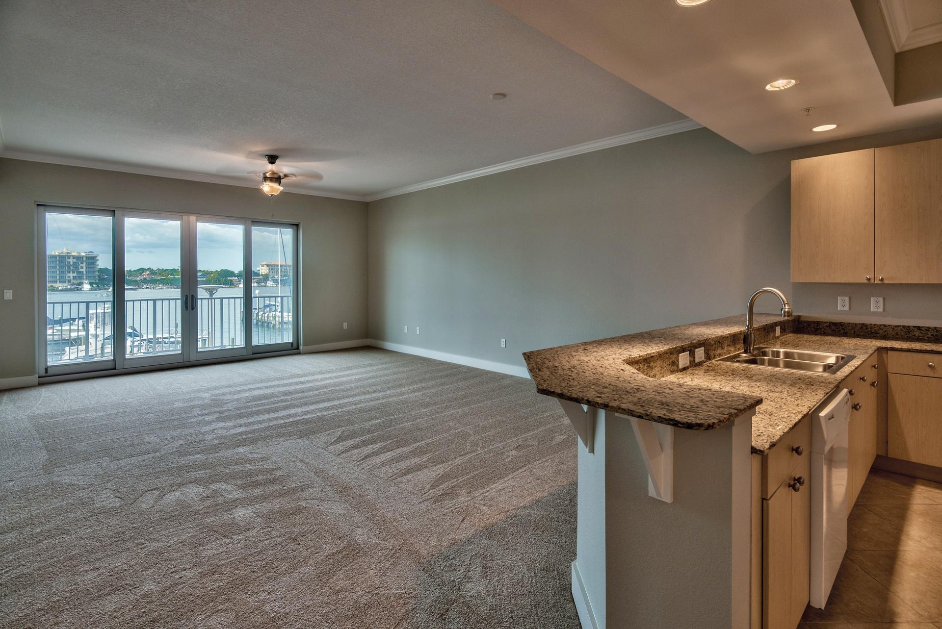 211 Durango Road, Unit 216 Destin, FL 32541 - Photo 12 of 35 a kitchen with a stove and a sink