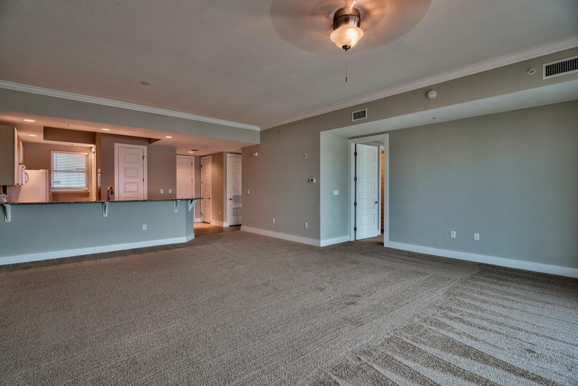 211 Durango Road, Unit 216 Destin, FL 32541 - Photo 13 of 35 a view of a livingroom with a ceiling fan and window