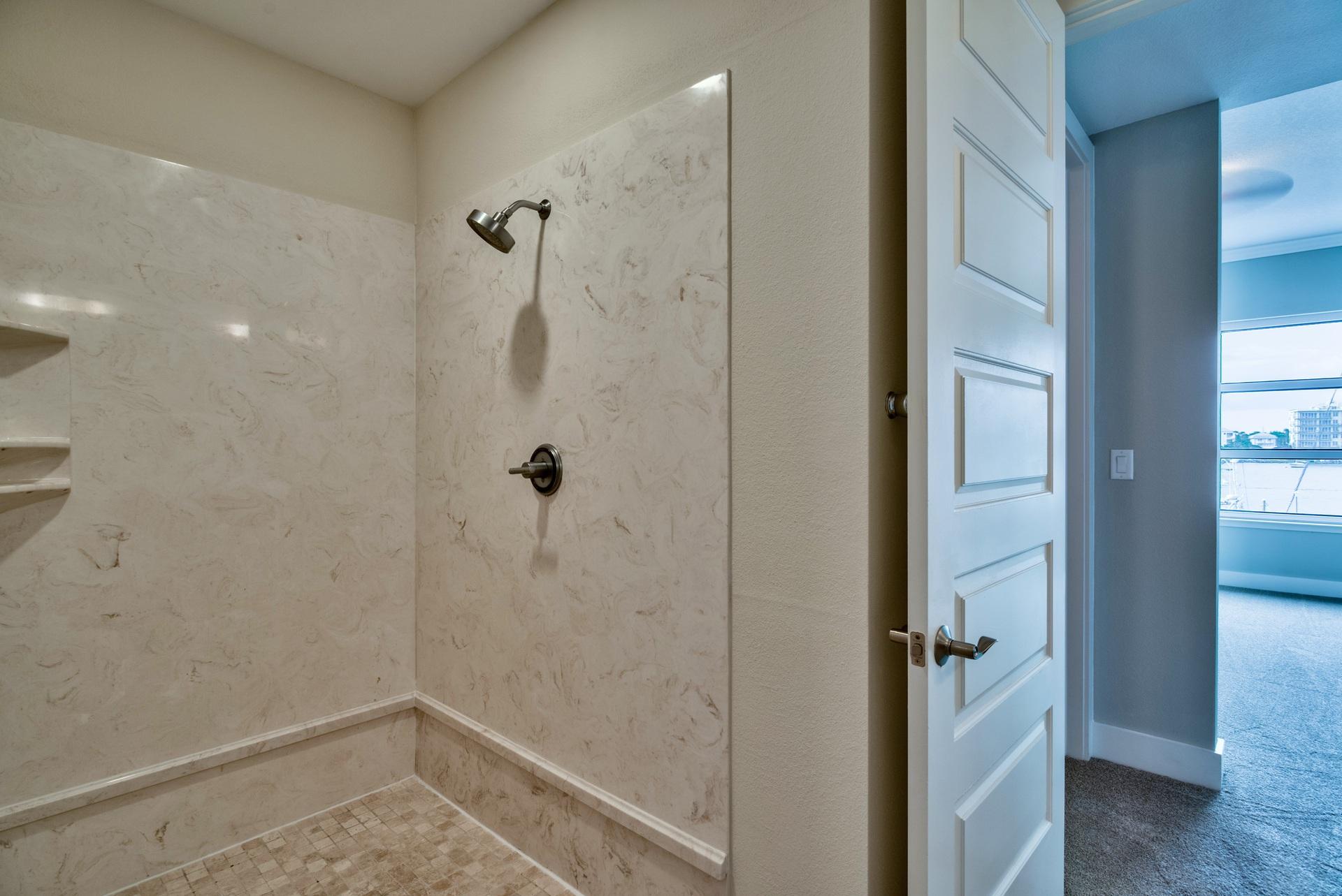 211 Durango Road, Unit 216 Destin, FL 32541 - Photo 17 of 35 a bathroom with a shower