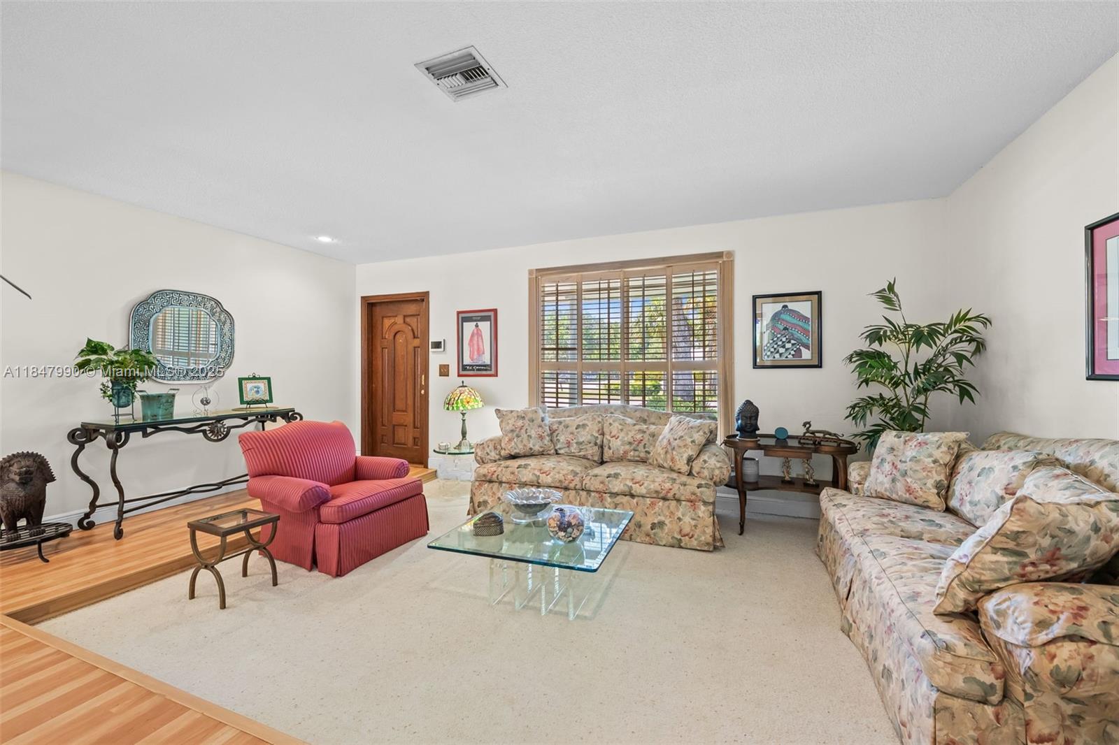 5414 West Park Road Hollywood, FL 33021 - Photo 9 of 19 a living room with furniture and wooden floor