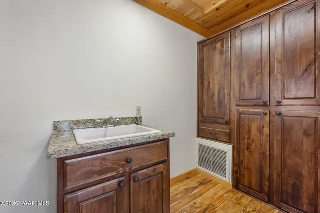 a view of a patio with a mountain in the background