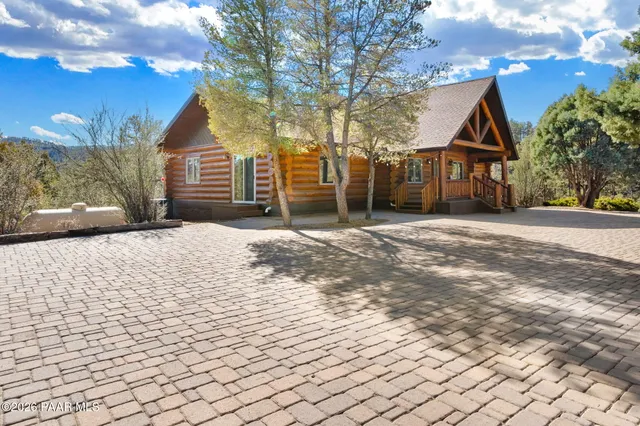 a view of a golf course with a lake