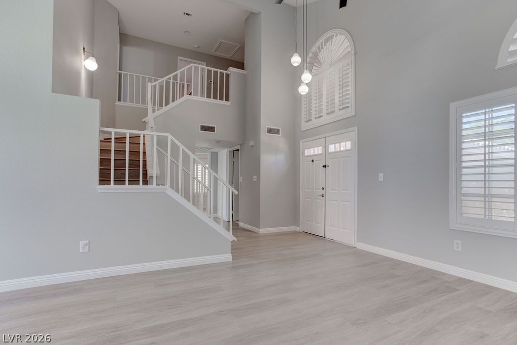 1416 Walstone Road North Las Vegas, NV 89031 - Photo 6 of 47 A spacious entry, with high ceilings and light flooring, invites you into this home.