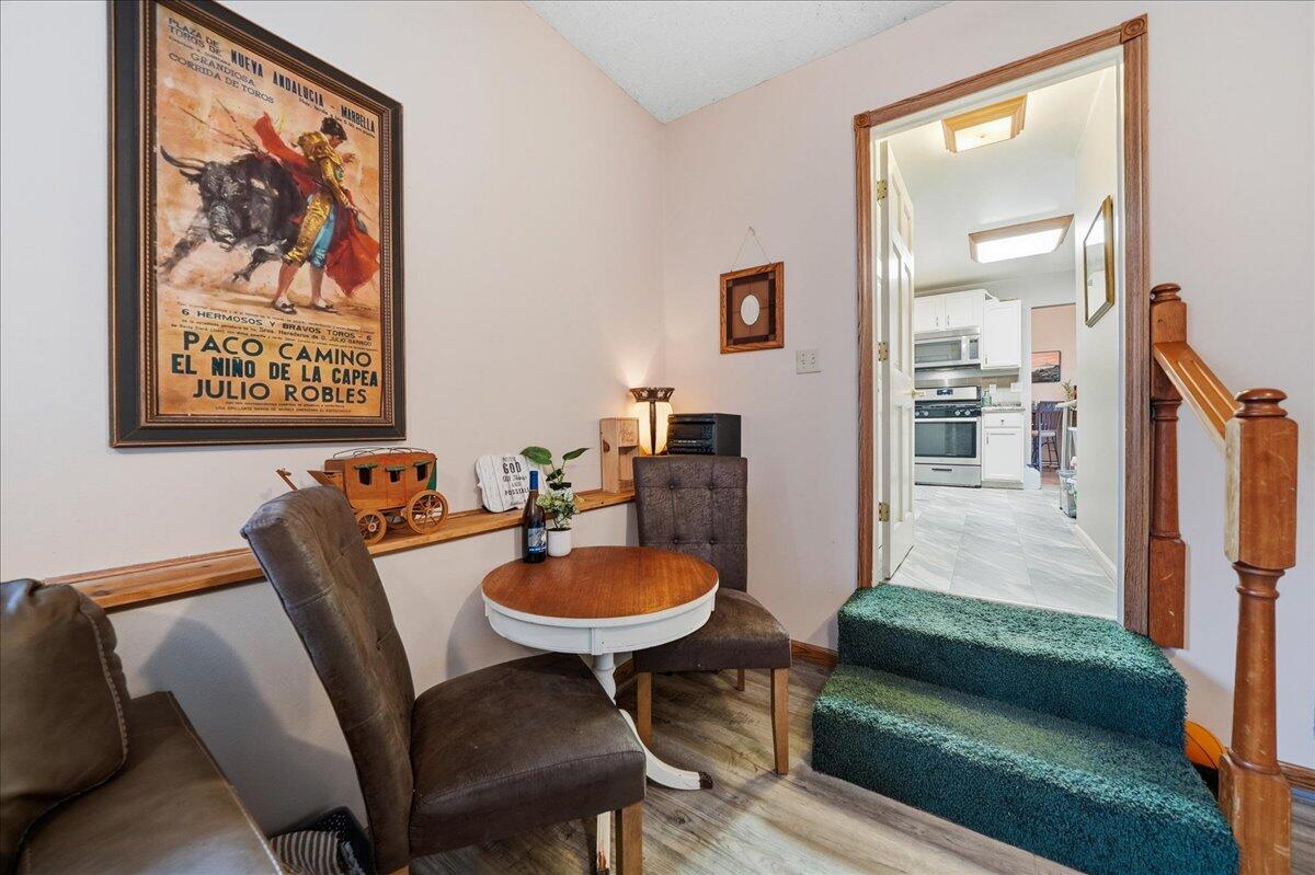 2258 Iris Street Portage, IN 46368 - Photo 14 of 29 a view of a dining room with furniture and wooden floor