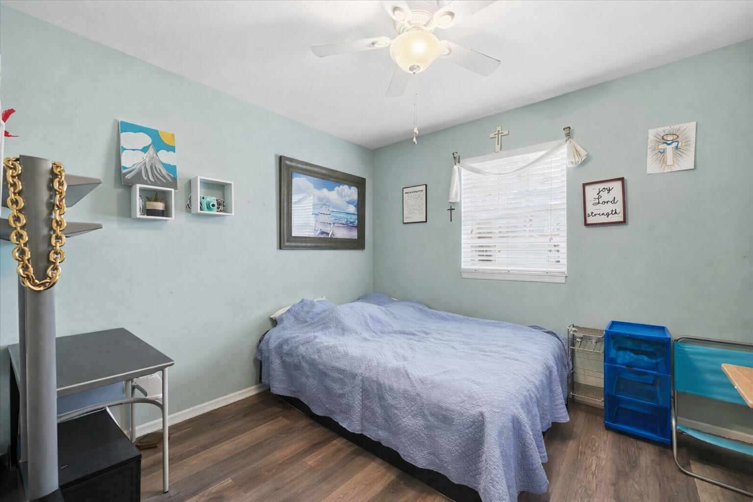 2258 Iris Street Portage, IN 46368 - Photo 20 of 29 a bedroom with a bed and a window