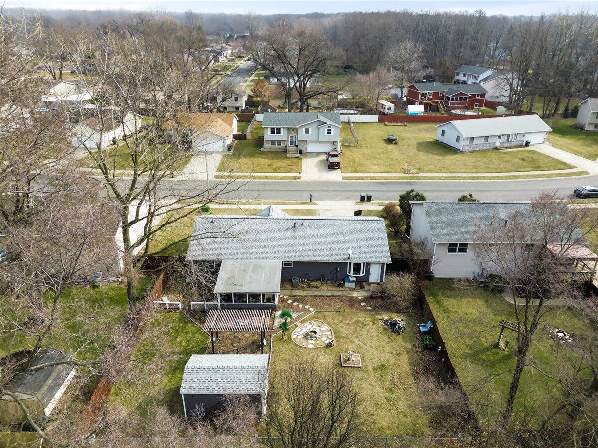 2258 Iris Street Portage, IN 46368 - Photo 26 of 29 a view of a swimming pool with a patio