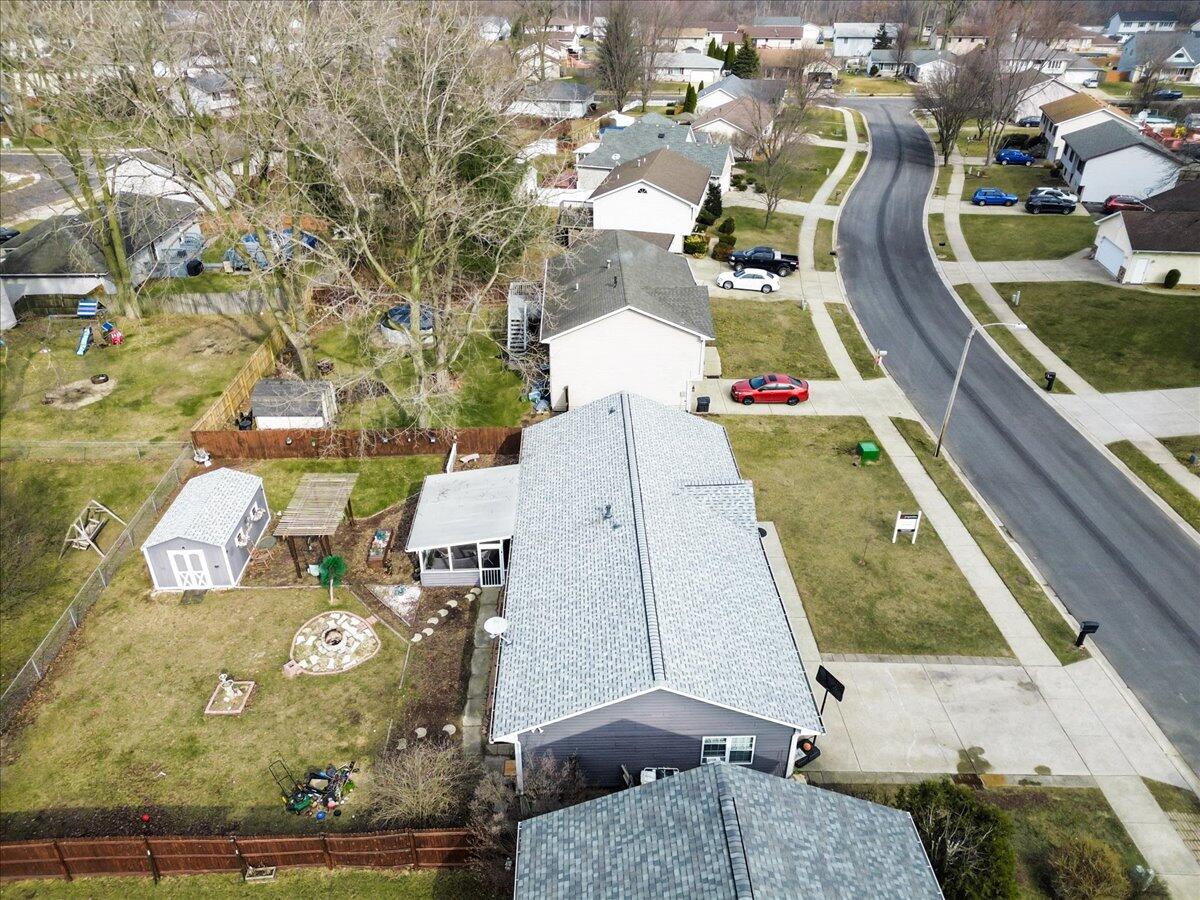 2258 Iris Street Portage, IN 46368 - Photo 27 of 29 an aerial view of residential houses with outdoor space
