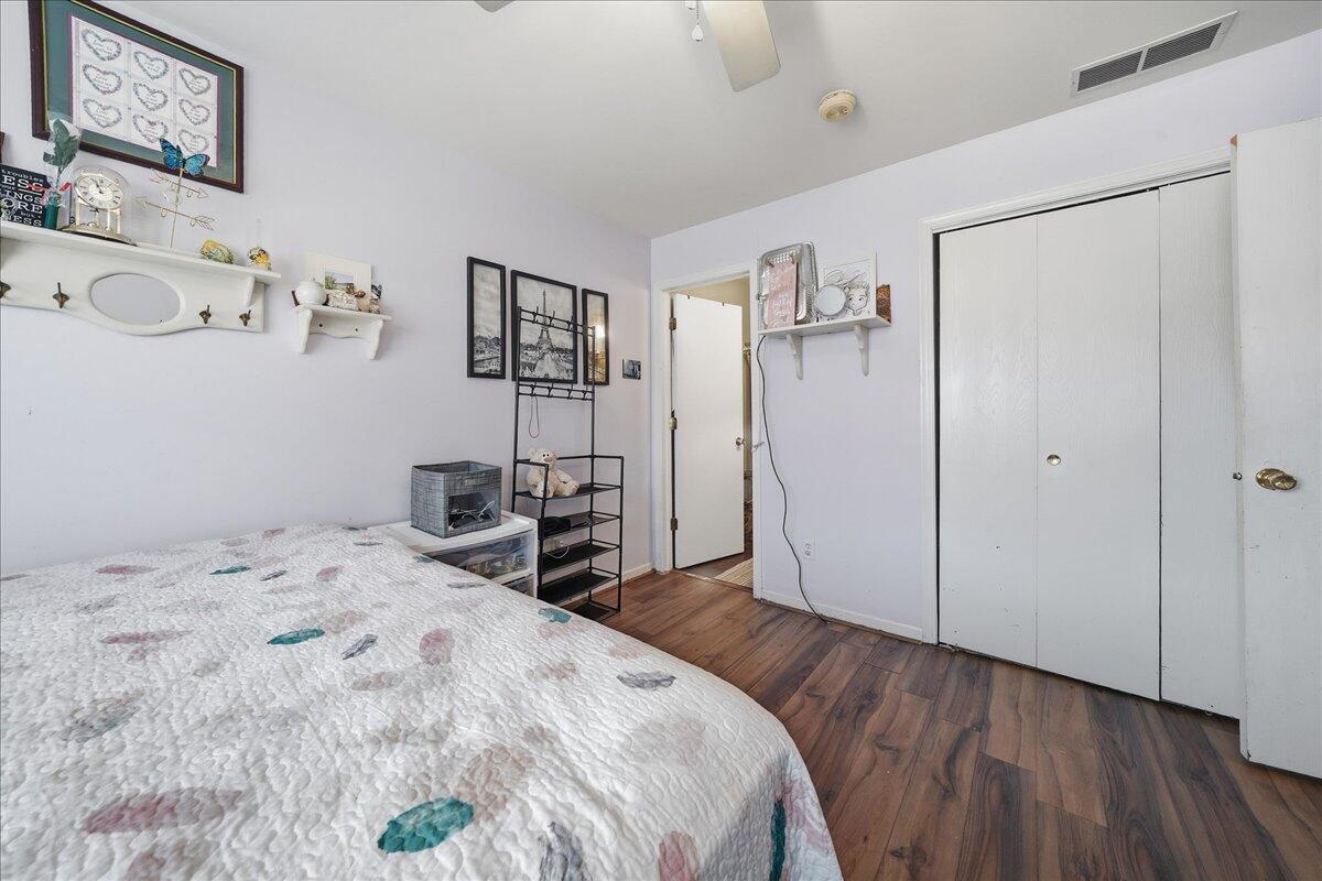 2258 Iris Street Portage, IN 46368 - Photo 8 of 29 a bedroom with a bed and a dresser
