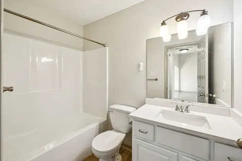 a view of a swimming pool with a yard