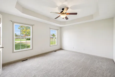 a view of a house with a roof deck