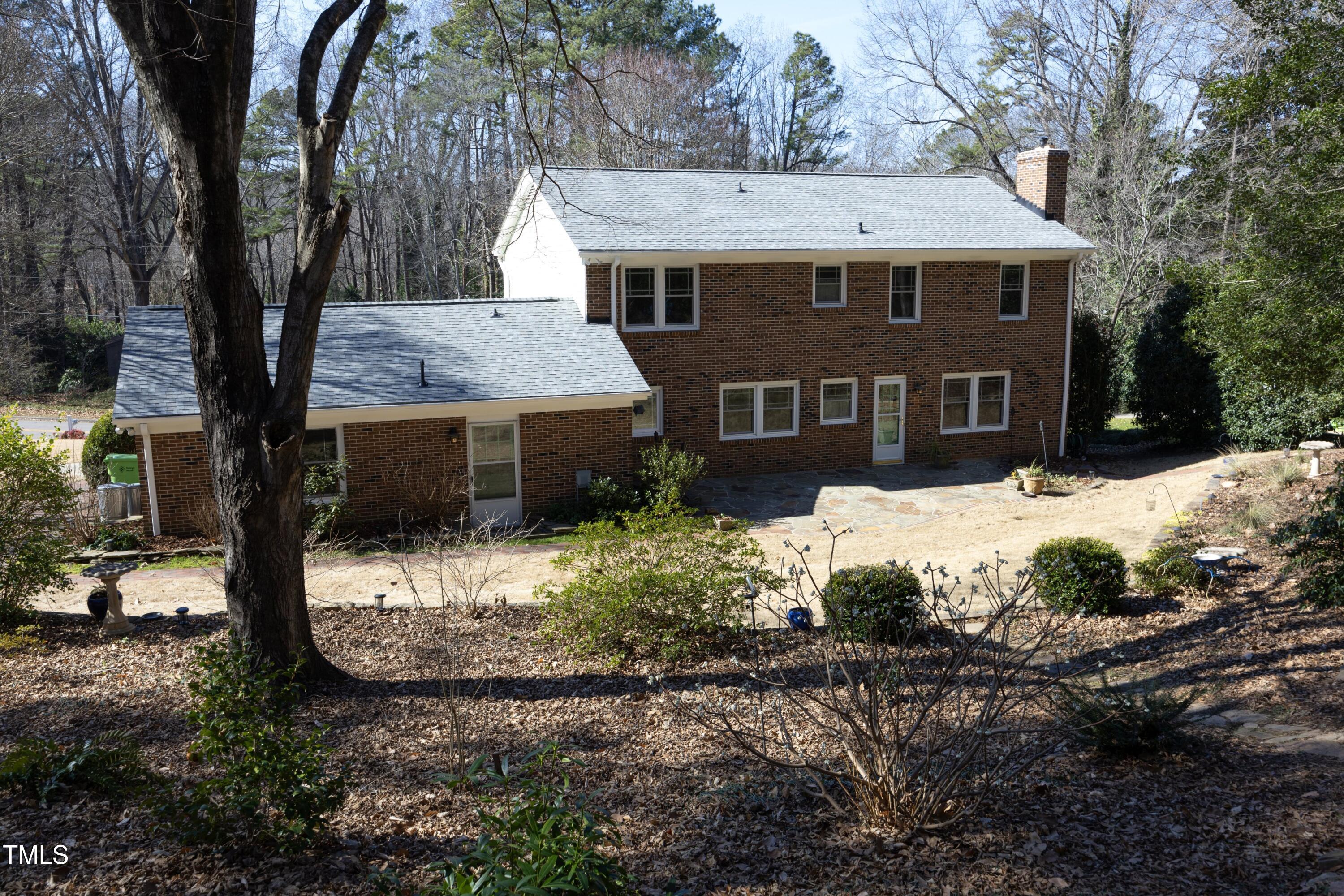 4616 Oak Park Road Raleigh, NC 27612 - Photo 51 of 63 View of back of home from workshop