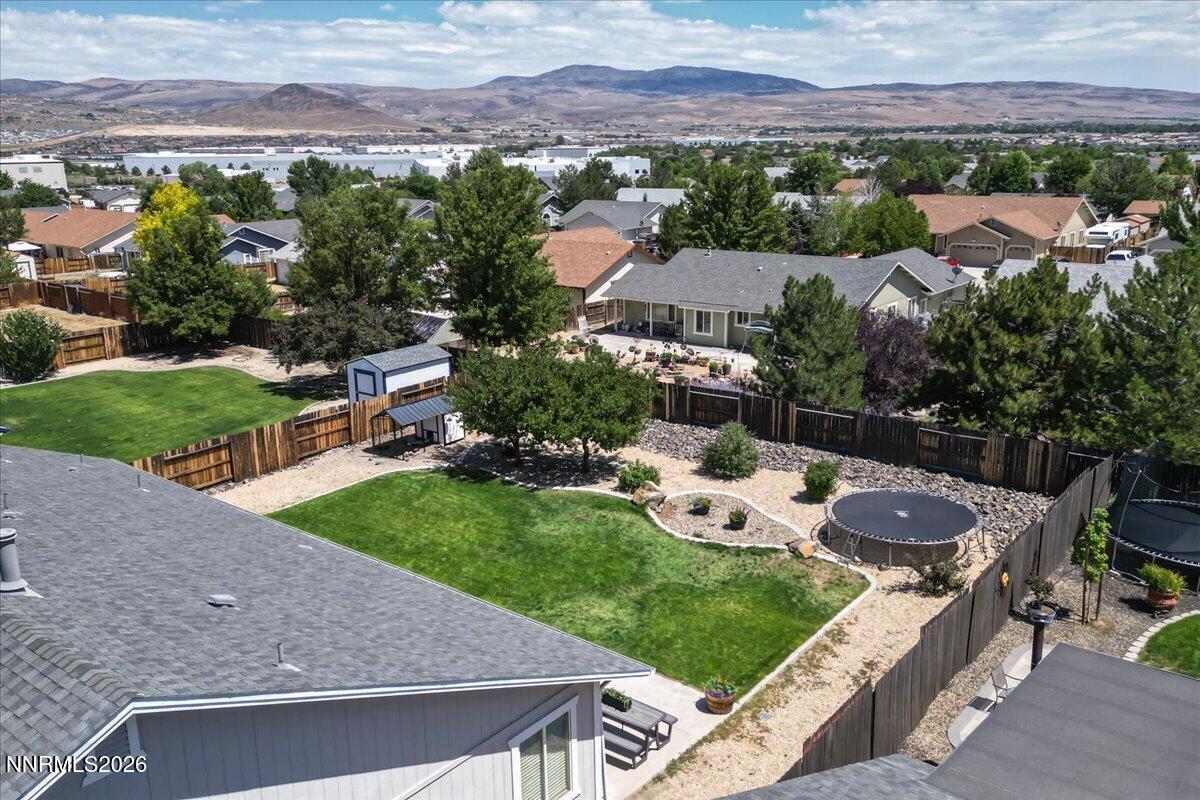 2400 Pileus Road Spanish Springs, NV 89441 - Photo 23 of 29 an aerial view of a house with garden space and street view