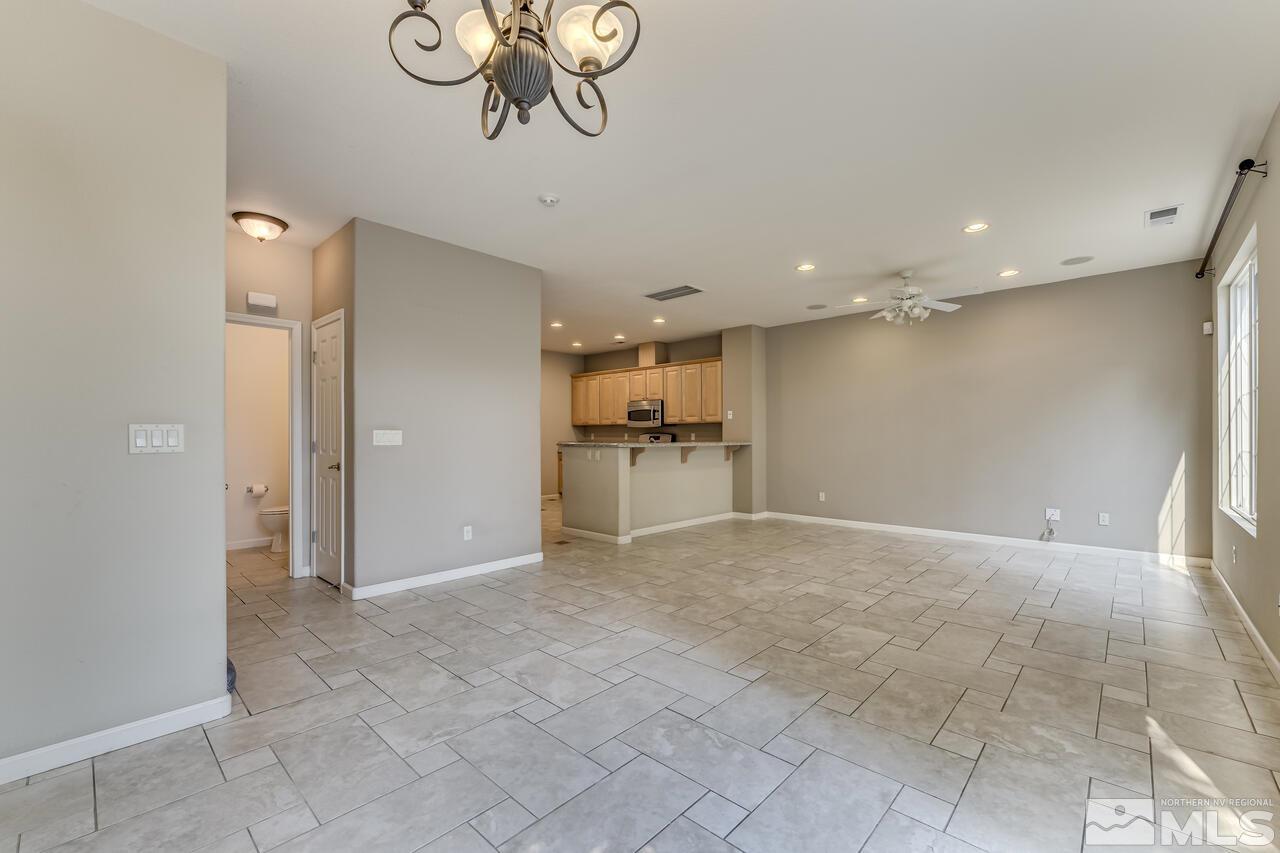 1887 Resistol Drive Reno, NV 89521 - Photo 7 of 36 a view of a livingroom with a kitchen