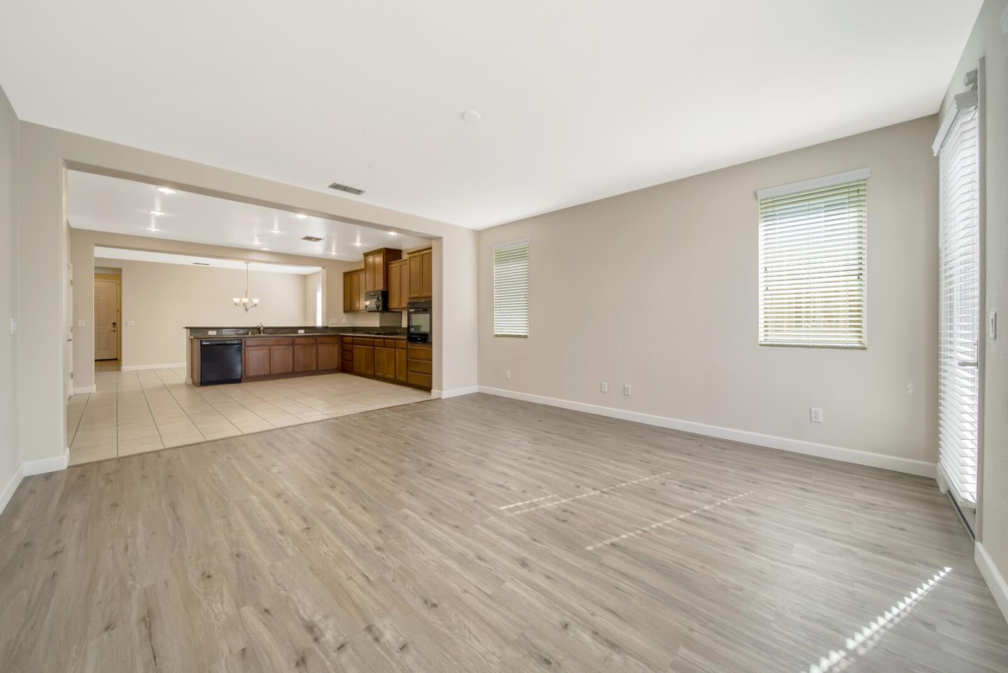1479 Orgullo Lane Manteca, CA 95337 - Photo 17 of 39 a view of empty room with wooden floor