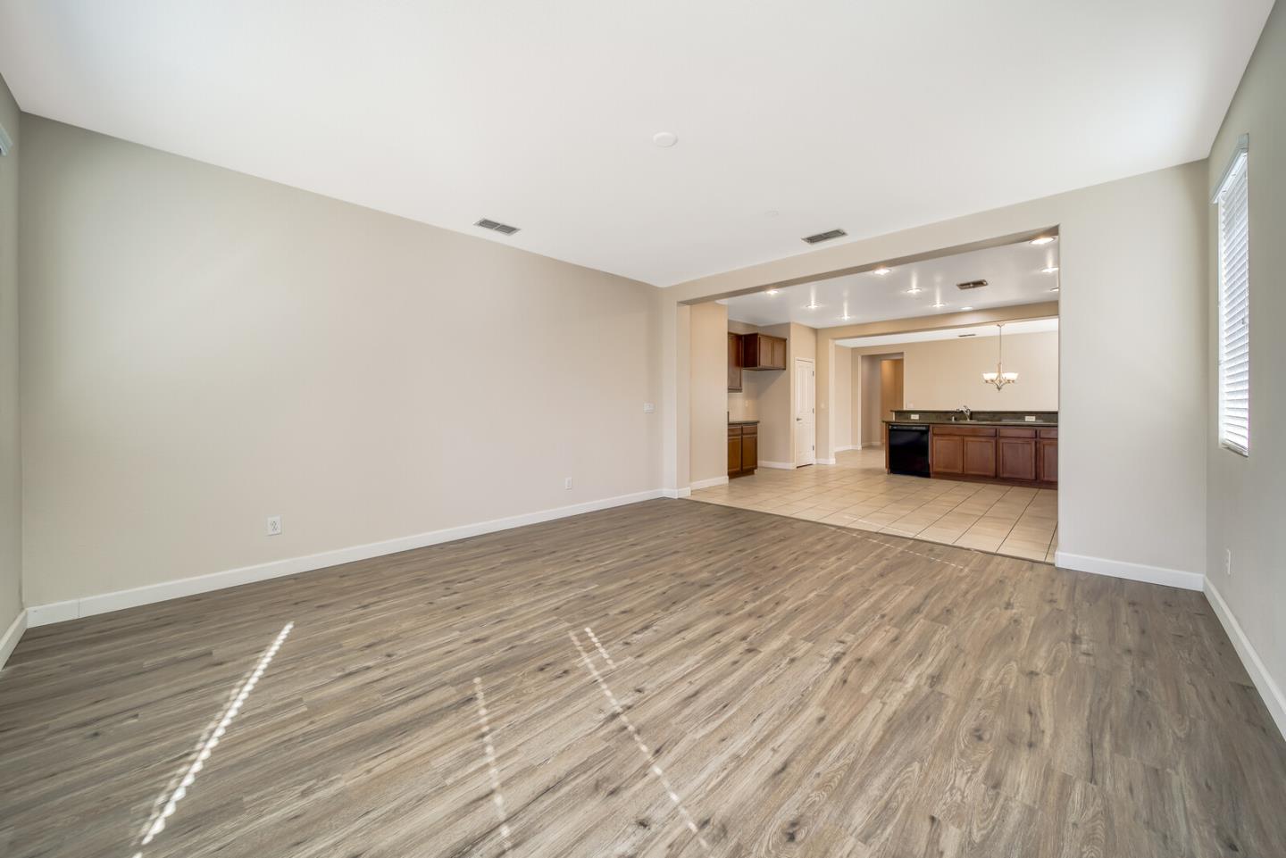 1479 Orgullo Lane Manteca, CA 95337 - Photo 19 of 39 a view of empty room with wooden floor