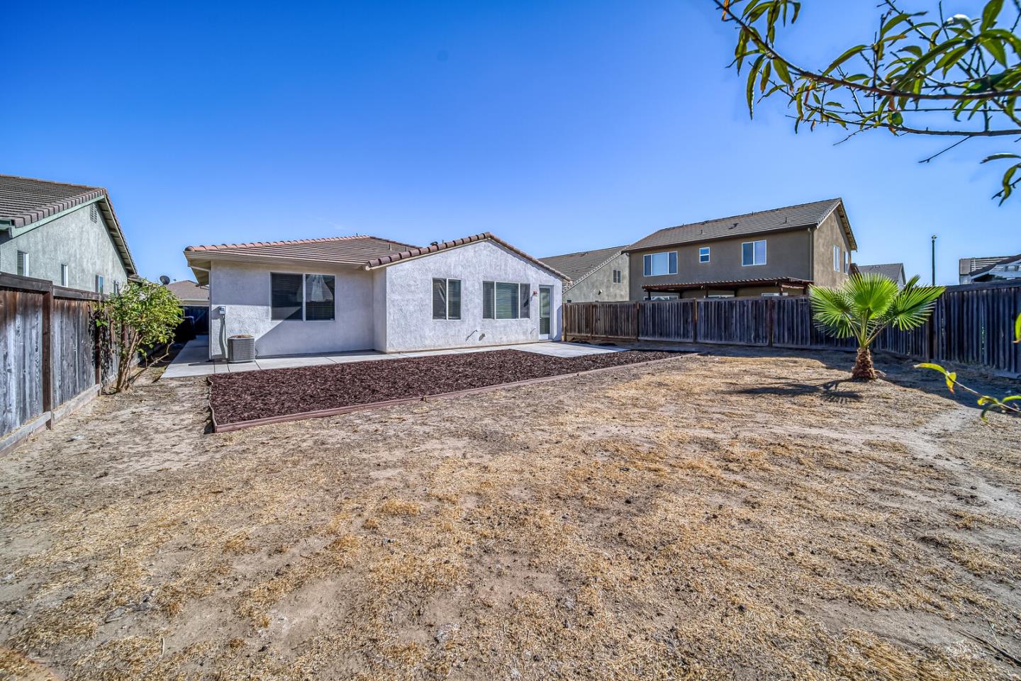 1479 Orgullo Lane Manteca, CA 95337 - Photo 37 of 39 a front view of a house with a yard