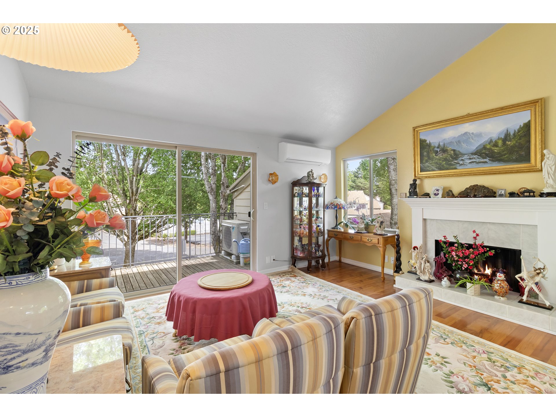 10137 Southwest Trapper Terrace Beaverton, OR 97008 - Photo 13 of 39 a bedroom with furniture and a fireplace